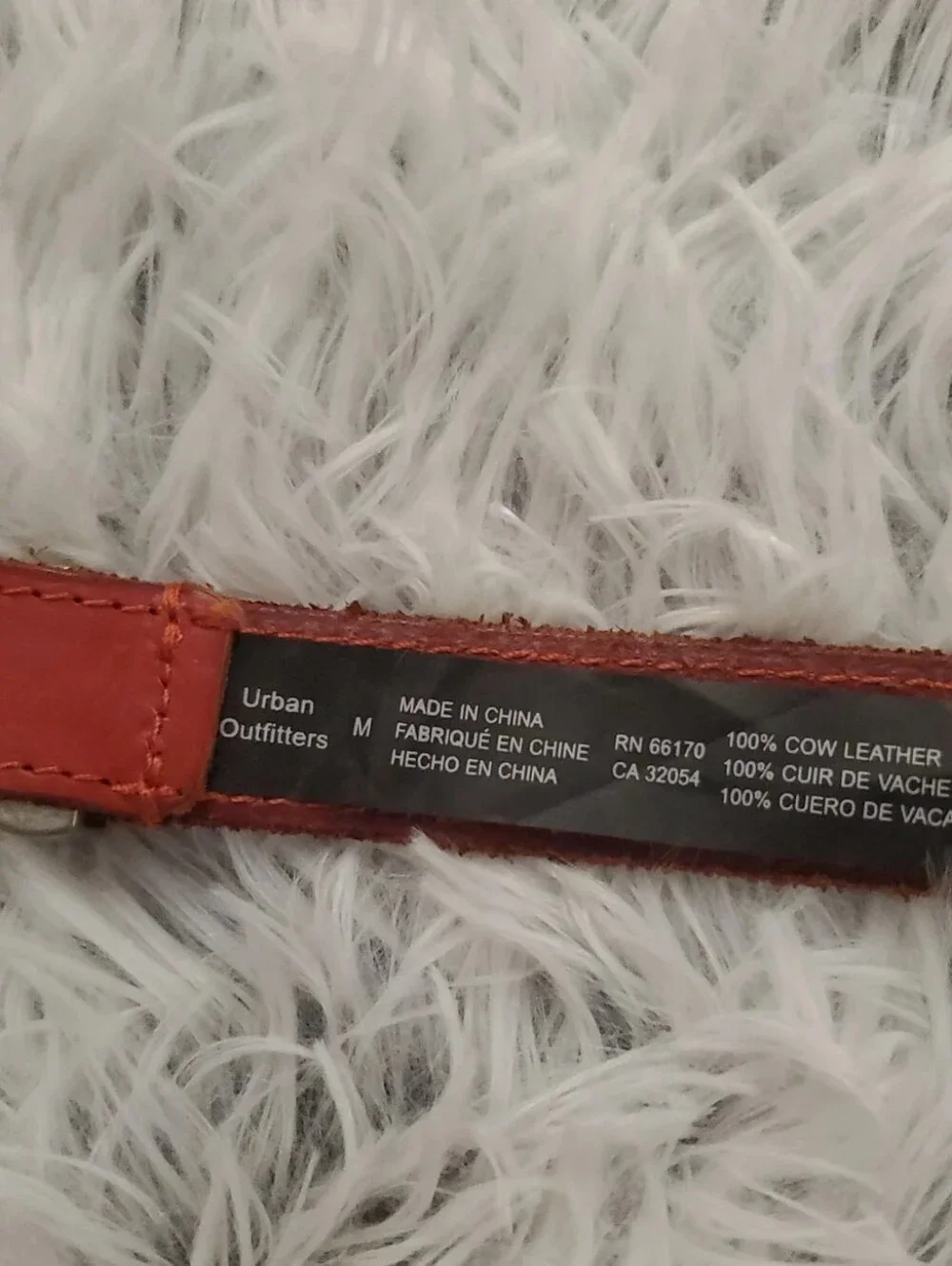 **Urban Outfitters Red Leather Belt with Silver Concho Accents**